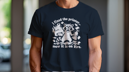 Man Wearing T-Shirt mockup - I FIXED THE PRINTER NOW IT'S ON FIRE (MANUAL_MOT3D5WN) [dynamic_lifestyle]