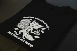 Folded T-Shirt mockup - DEADLINE WAS YESTERDAY. JUST FOUND OUT TODAY. (MANUAL_MOTAP3F9) [dynamic_lifestyle]
