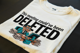 Folded T-Shirt mockup - This Meeting Could've Been Deleted (CG5194) [dynamic_lifestyle]