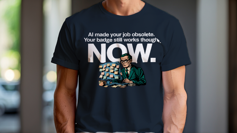 Man Wearing T-Shirt mockup - AI MADE YOUR JOB OBSOLETE. YOUR BADGE STILL WOR... (CG8005) [dynamic_lifestyle]