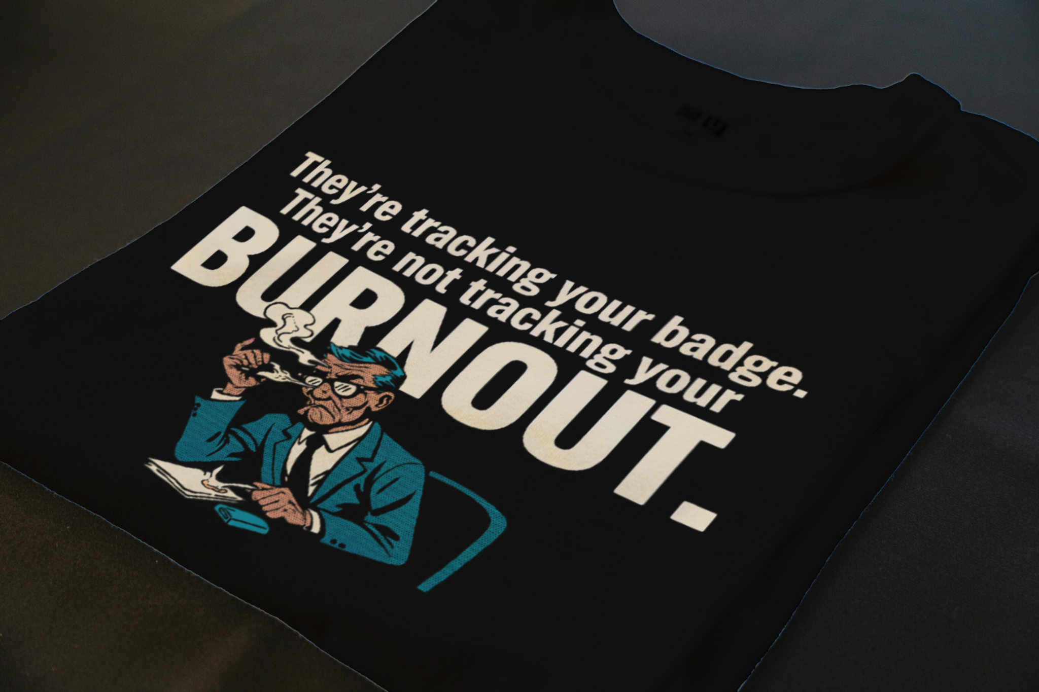 THEY'RE TRACKING YOUR BADGE. THEY'RE NOT TRACKING YOUR BU... | Corporate Grind Tee