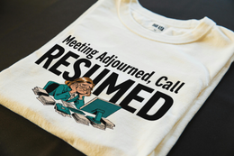 Folded T-Shirt mockup - Meeting Adjourned, Call Resumed (CG4871) [dynamic_lifestyle]