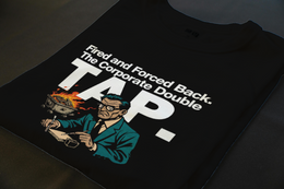Folded T-Shirt mockup - FIRED AND FORCED BACK. THE CORPORATE DOUBLE TAP. (CG7702) [dynamic_lifestyle]