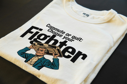 Folded T-Shirt mockup - Commute or Quit: Choose Your Fighter (CG4157) [dynamic_lifestyle]