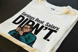 Folded T-Shirt mockup - EARNINGS BEAT. SALARY DIDN'T. (CG8087) [dynamic_lifestyle]