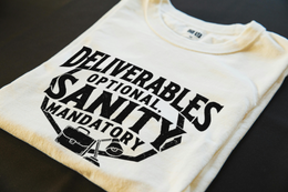 Folded T-Shirt mockup - Deliverables Optional, Sanity Mandatory (CG5715) [dynamic_lifestyle] | v=1775161915630
