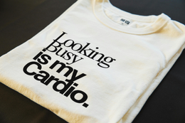 Folded T-Shirt mockup - Looking busy is my cardio. (CG3925) [dynamic_lifestyle]